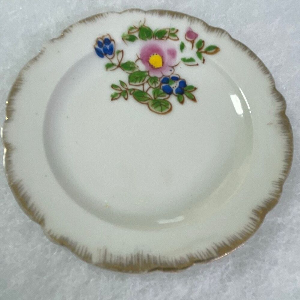 Mid century Japan butter gold trimmed floral dish.